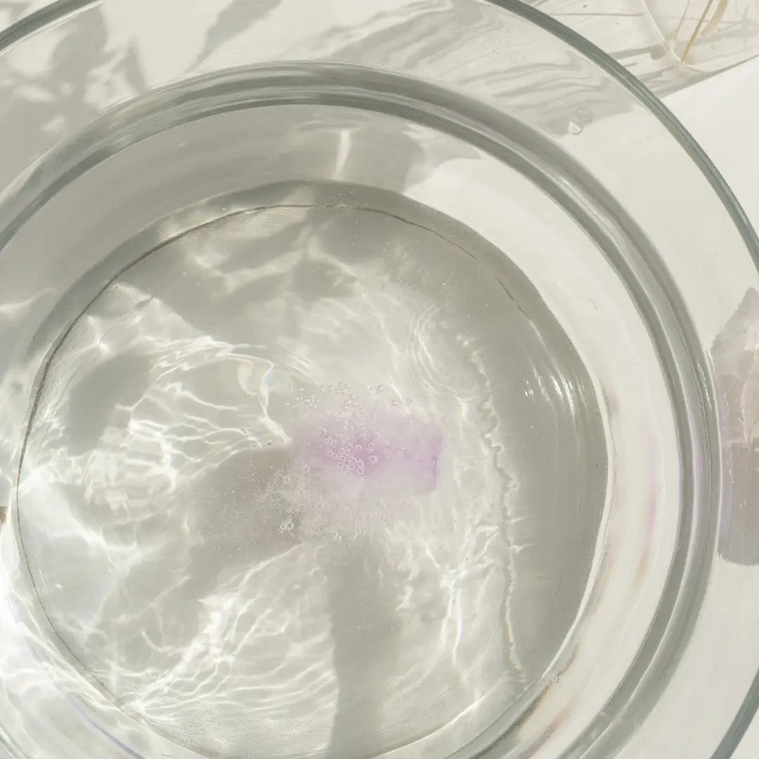Lavender Luxury Mini Bath Fizzies in water