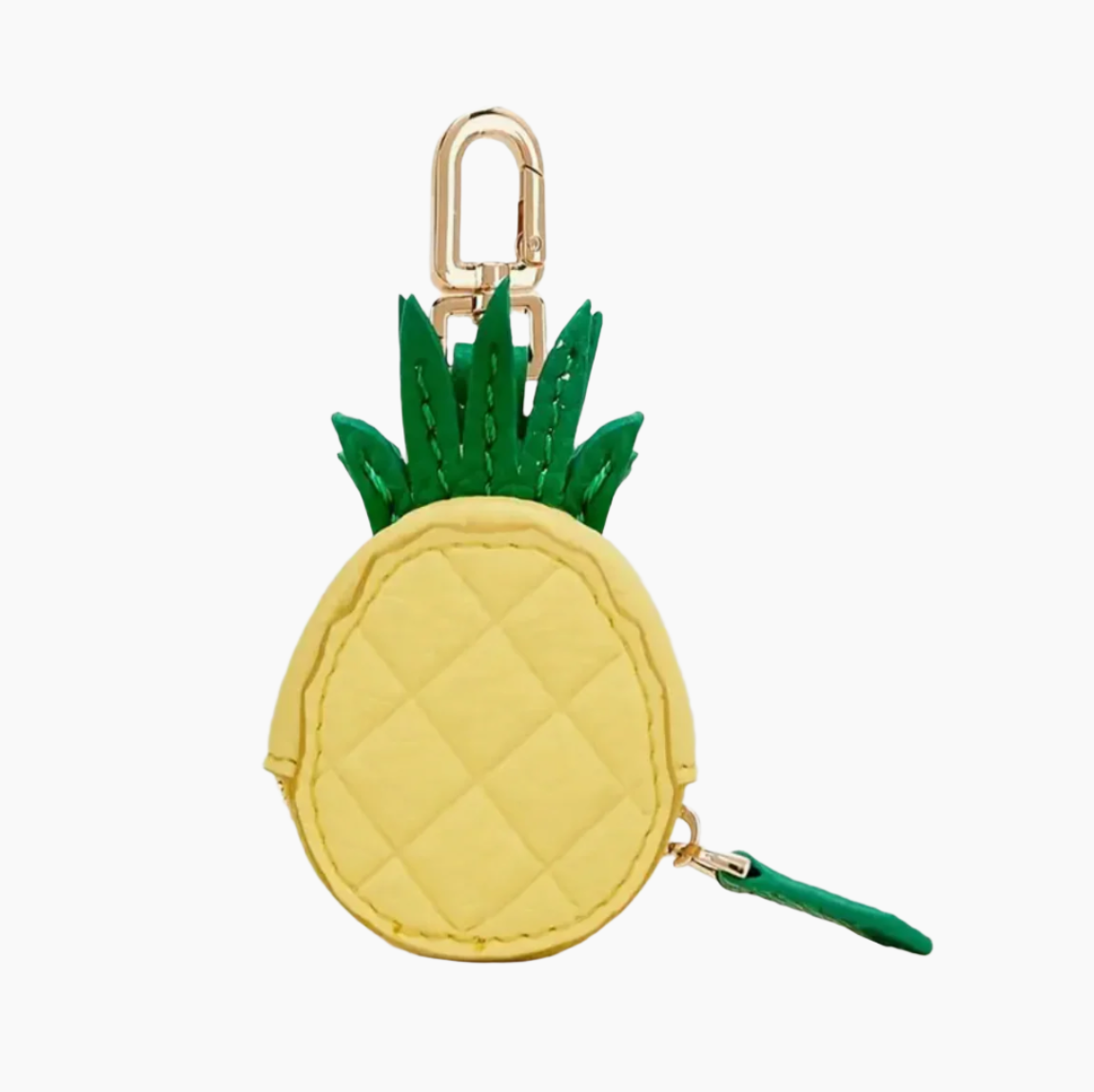 Pineapple-shaped keychain with green leaves on a light gray background